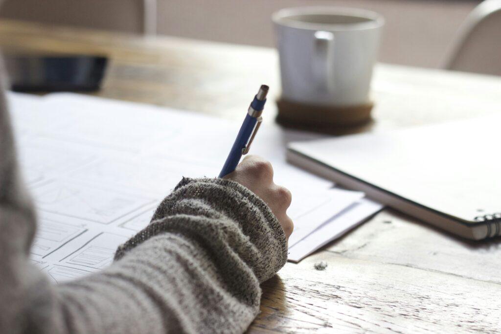 person writing specific measurable terms-thinking backwards strategy person writing specific measurable terms-thinking backwards strategy